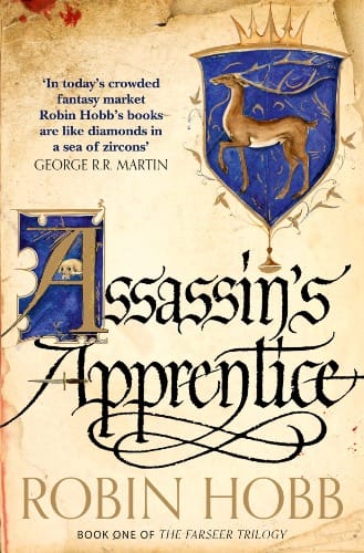 Book cover with old parchment background for "Assassin's Apprentice" by Robin Hobb